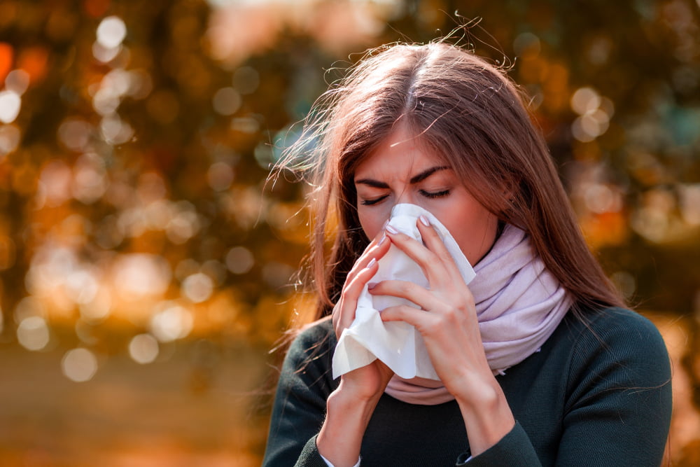 Woman experience Fall allergy symptoms in Atlanta